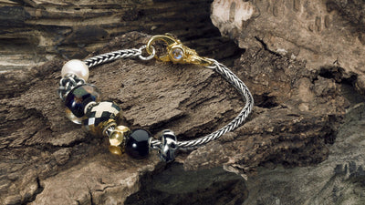 Foxtail bracelet with gold lock and fine Trollbeads beads